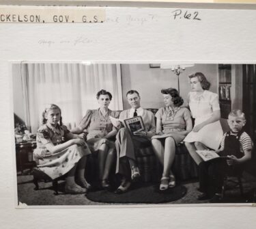 George T. Mickelson, wife Madge, and four children at home