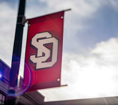 The USD logo hangs on campus.