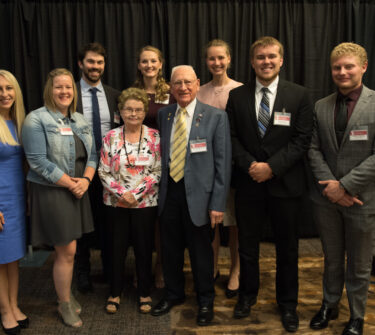 Arnold and Alanna Fenske pose with scholarship recipients at the Sanford School of Medicine scholarship dinner.