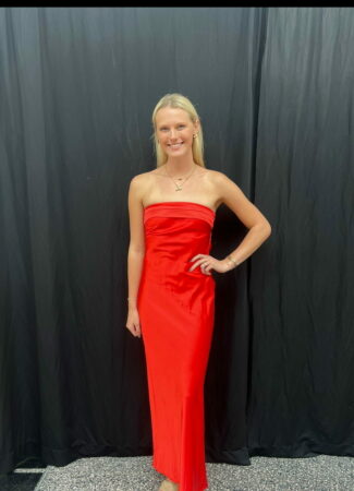 Tiffany Pelton in red gown.
